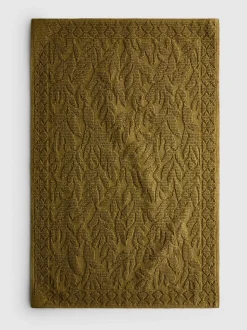 Alfombrilla de baño con hojas