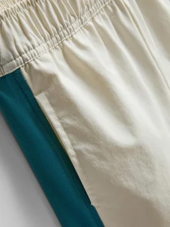 7-15 años | Camiseta y pantalones cortos deportivos