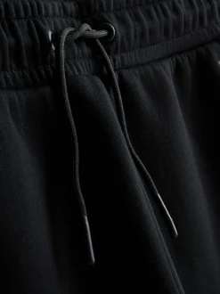 9-15 años | Joggers con bajos ajustados