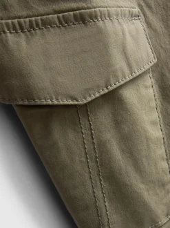 7-15 años | Pantalones cargo con bajos ajustados