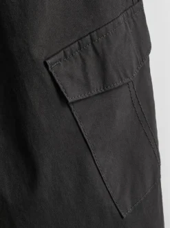 7-15 años | Pantalones cargo con bajos ajustados