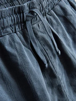 7-15 años | Pantalones cortos y camisa con solapas