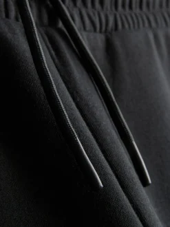 7-15 años | Pantalones de chándal reforzados con bajos ajustados
