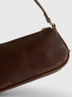 Bandolera con hebillas y bolsillos
