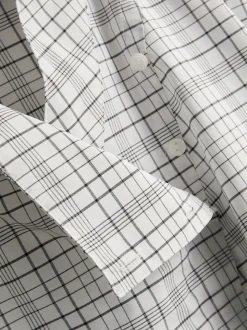 Blusa de cuello alto a cuadros con mucho algodón