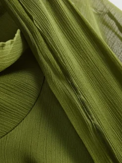 Blusa de manga corta con lazo en el cuello