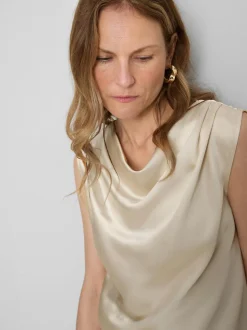Blusa de satén con cuello drapeado