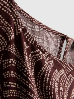 Blusa estampada con mangas