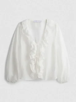 Blusa transparente con volantes