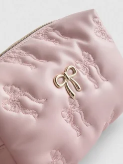 Bolsa de maquillaje acolchada con lazos