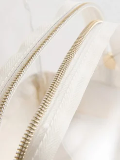 Bolsa de maquillaje transparente con inicial