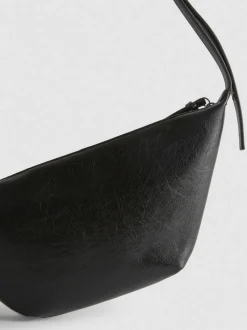 Bolso cruzado con tachuelas