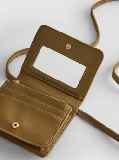 Bolso cruzado con tachuelas