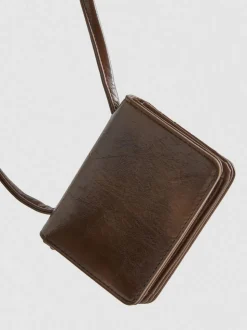 Bolso cruzado con tachuelas