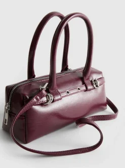 Bolso de hombro con detalle de ojales