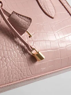 Bolso de mano con efecto piel de cocodrilo