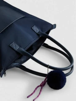 Bolso tote con cierre de cremallera y colgante