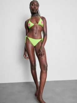 Braguitas de bikini con cuentas y lazos laterales