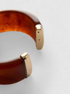 Brazalete con bisagras de efecto resina