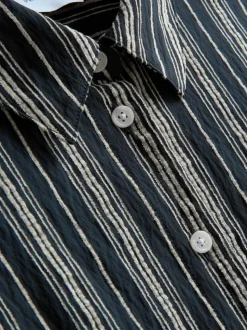 Camisa a rayas holgada