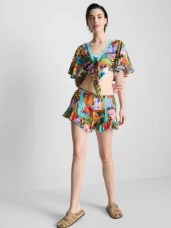 Camisa corta con estampado tropical y lazo