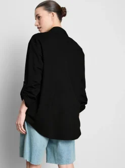Camisa de punto holgada