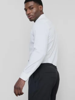 Camisa elástica entallada con botones