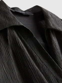 Camisa fruncida de estilo vacacional