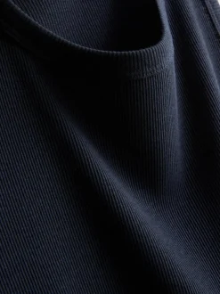 Camisa sin mangas de canalé