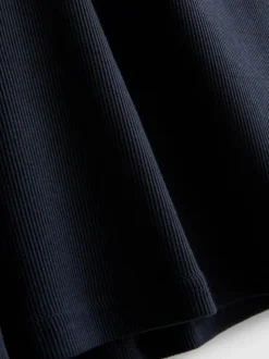 Camisa sin mangas de canalé
