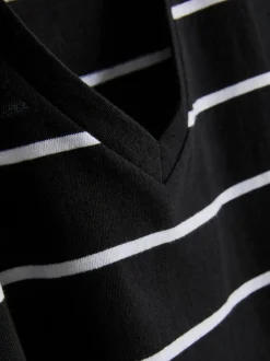 Camiseta a rayas de algodón puro con cuello de pico