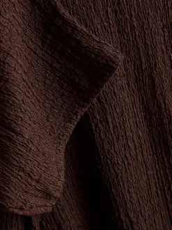 Camiseta asimétrica con textura