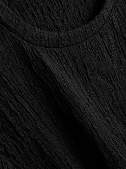 Camiseta asimétrica con textura