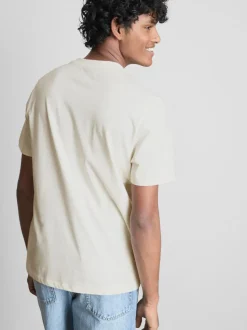 Camiseta con estampado gráfico «Paradise Beach»