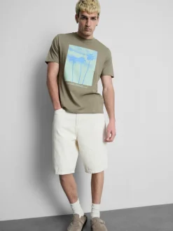 Camiseta con gráficos de palmeras