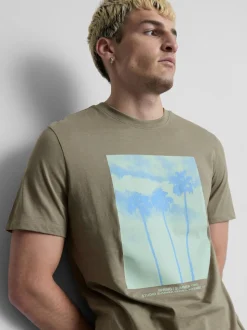 Camiseta con gráficos de palmeras
