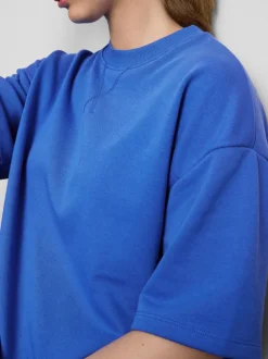 Camiseta con hombros caídos para el aeropuerto