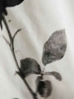Camiseta corta floral de algodón