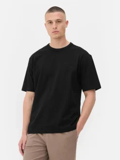 Camiseta de algodón holgada con cuello redondeado