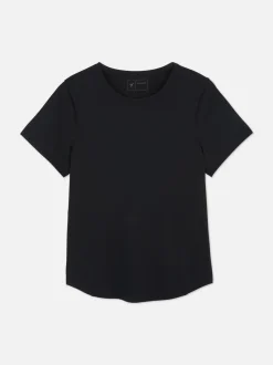 Camiseta de alto rendimiento con bajo curvo