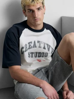 Camiseta de manga raglán «Creative Studio»