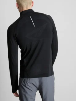 Camiseta deportiva con cremallera de 1/4