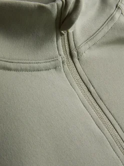 Camiseta deportiva con cremallera de 1/4