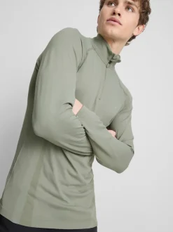 Camiseta deportiva con cremallera de 1/4