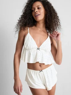 Camiseta de tirantes y pantalones cortos de lunares