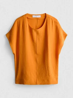 Camiseta relajada y fluida con cuello redondo