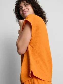 Camiseta relajada y fluida con cuello redondo