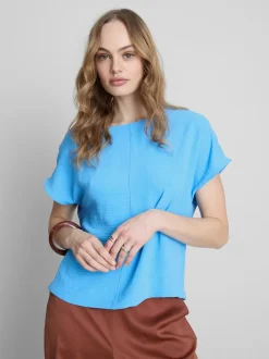 Camiseta relajada y fluida con cuello redondo