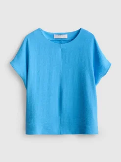 Camiseta relajada y fluida con cuello redondo