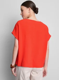 Camiseta relajada y fluida con cuello redondo